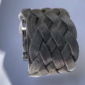 ELEGANT SILVER CUFF CRISSCROSSED/BRAIDED BRACELET